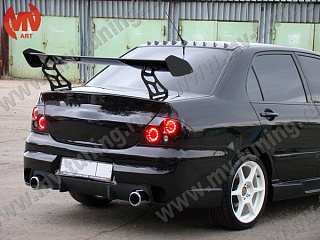 Задний бампер Mitsubishi Lancer IX в стиле INGS Extreem под двойной выхлоп (2003-2009)